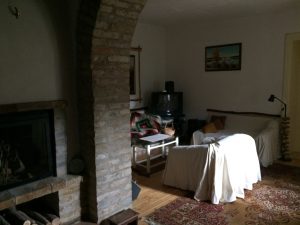 Common room with fire place and baking oven